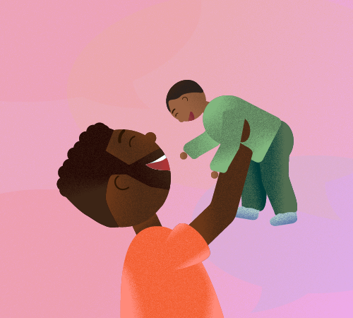 Father holding child in the air and smiling